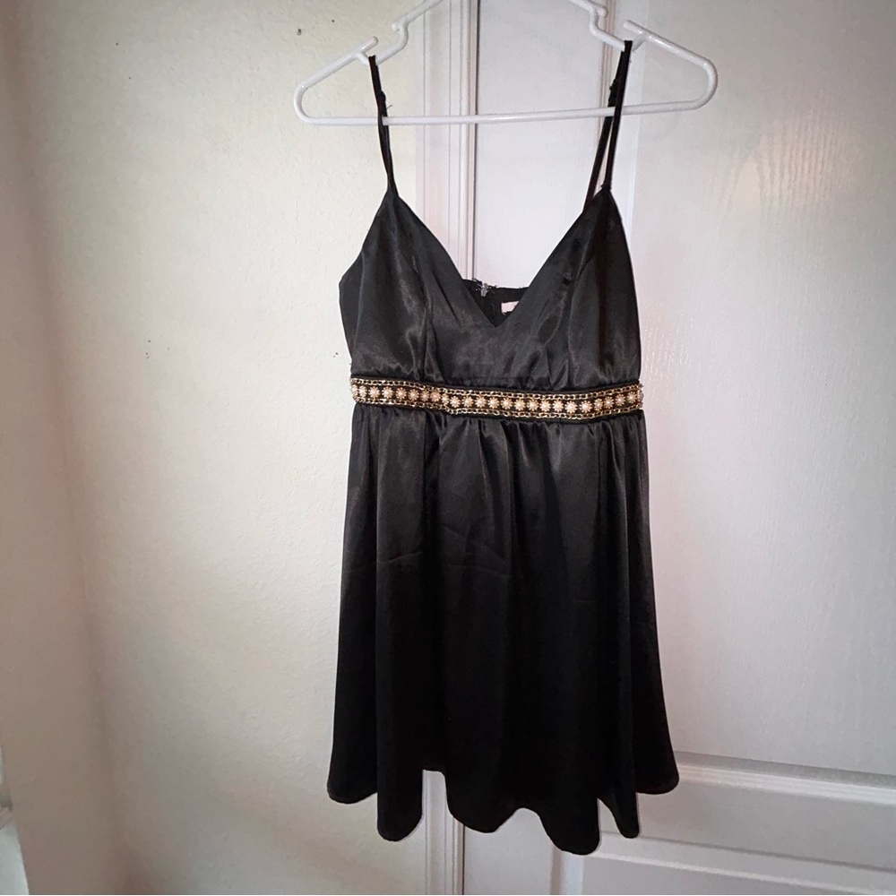 Cute mi Ami little black dress with gold accent belt !